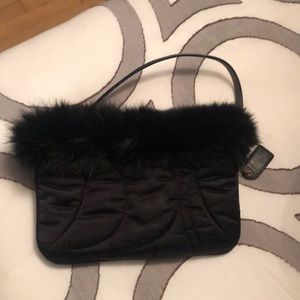 Fur trimmed nylon wristlet